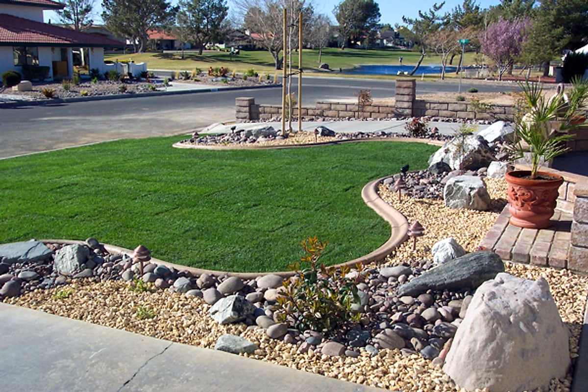 Front lawn with curbing, cobbles, boulders and pavers